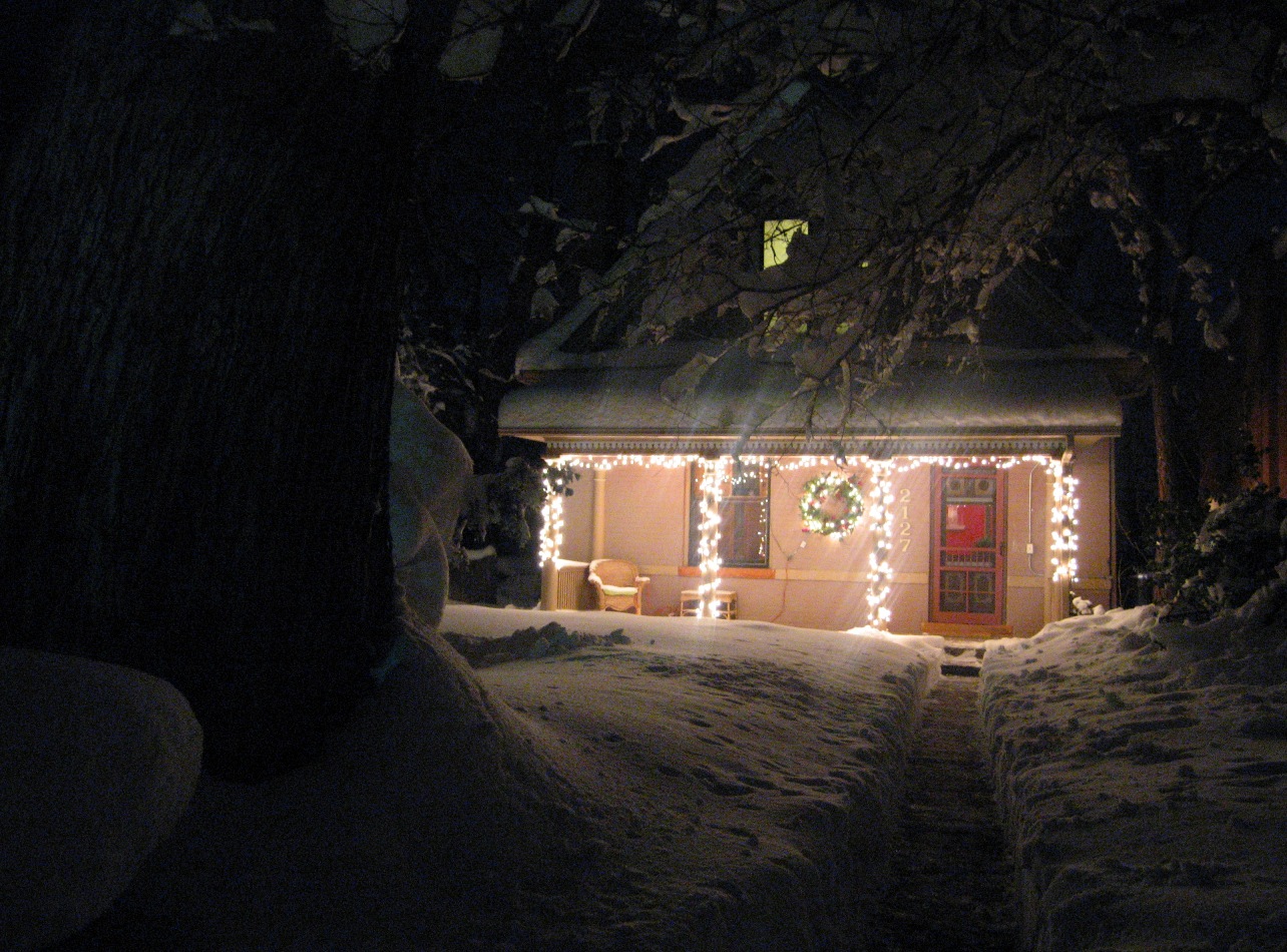 Our House Lit by Christmas Lights and Lots of Snow